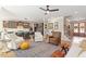 Spacious living area with hardwood floors, comfortable seating, and an open layout to kitchen at 45 Melody Dr, Youngsville, NC 27596