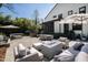 Spacious backyard with a fire pit, lounge chairs, a dining area, and a relaxing hot tub at 5004 Lakemont Dr, Raleigh, NC 27609