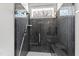 Sleek bathroom offers a glass enclosed shower with subway tiles and a built in bench at 5004 Lakemont Dr, Raleigh, NC 27609