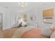Bright bedroom with a desk, and light and airy aesthetic at 5004 Lakemont Dr, Raleigh, NC 27609