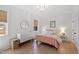 Comfortable bedroom showcasing stylish furnishings, including a dresser and a charming color palette at 5004 Lakemont Dr, Raleigh, NC 27609