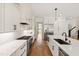 Chef's kitchen boasting sleek countertops, custom cabinetry, and professional-grade appliances at 5004 Lakemont Dr, Raleigh, NC 27609