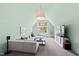 Bright living room boasts a sectional sofa, TV, and natural light at 5004 Lakemont Dr, Raleigh, NC 27609