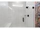 Modern glass shower with white subway tile and black fixtures at 5004 Lakemont Dr, Raleigh, NC 27609
