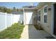 Private backyard space with vinyl fencing and well maintained patio, perfect for outdoor entertaining and relaxation at 536 Dearing Dr, Haw River, NC 27258