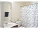 Cozy bathroom featuring a vanity, mirror and a shower with curtain at 536 Dearing Dr, Haw River, NC 27258