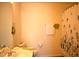 Cozy bathroom featuring stylish green accents, including towels and a decorative shower curtain at 536 Dearing Dr, Haw River, NC 27258