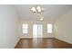 Open-concept living space with hardwood flooring and plenty of natural light, ideal for modern living at 536 Dearing Dr, Haw River, NC 27258
