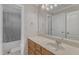 Bathroom featuring a single sink vanity with marble countertop at 5521 Erinvale Ct, Holly Springs, NC 27540