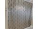 Bathroom featuring a tub/shower with modern shower curtain at 5521 Erinvale Ct, Holly Springs, NC 27540
