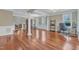Open living space with polished floors, bright windows, and lots of space at 5521 Erinvale Ct, Holly Springs, NC 27540