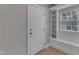 Mudroom featuring a built-in bench with storage and a view to the outdoors at 5521 Erinvale Ct, Holly Springs, NC 27540