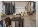 Organized walk-in closet with shelves, hanging racks, and storage bins at 607 N Queen St, Durham, NC 27701