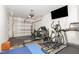 Spacious garage with ample room for parking and an array of fitness equipment at 607 N Queen St, Durham, NC 27701