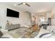 Bright, open-concept living room featuring stylish decor, hardwood floors, and contemporary furnishings at 607 N Queen St, Durham, NC 27701