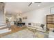 Bright, open-concept living room offering hardwood floors, modern décor, and seamless flow at 607 N Queen St, Durham, NC 27701
