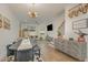 Bright, open-concept space with modern lighting, stylish furnishings, hardwood floors and staircase at 607 N Queen St, Durham, NC 27701