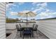 Open-air rooftop deck offers a dining area for outdoor meals with views at 607 N Queen St, Durham, NC 27701