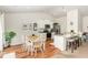 Eat-in kitchen with stainless steel appliances, granite countertops, and breakfast bar seating at 733 Frosty Way, Zebulon, NC 27597