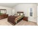 The primary bedroom features recessed lighting, neutral decor, and plush carpeting at 733 Frosty Way, Zebulon, NC 27597