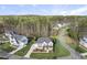 Aerial view showcases a beautiful two-story house on a large lot in a suburban neighborhood at 8117 Fergus Ct, Wake Forest, NC 27587