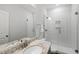 Modern bathroom featuring double glass shower with white subway tiles and granite countertop with single sink and faucet at 8117 Fergus Ct, Wake Forest, NC 27587