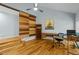 Cozy office space with hardwood floors, creative wood door, and ample desk space at 8805 Leesville Rd, Raleigh, NC 27613