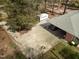 Aerial view showcasing the driveway and part of the roof at 906 Perry Rd, Zebulon, NC 27597