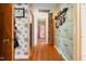 Hallway featuring hardwood floors and wall coverings at 906 Perry Rd, Zebulon, NC 27597