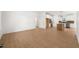 Open-concept living room showcasing a modern kitchen with stainless steel appliances and island at 9550 Stallings Road Rd, Spring Hope, NC 27882