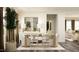 Bright dining area featuring a wooden table with seating for six and stylish decor at 1002 Sora Way, Durham, NC 27703