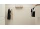 Bright walk-in closet features white walls, wire shelving, and ample hanging space at 1011 Red Roses Ave, Durham, NC 27703
