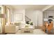 Inviting living room with comfortable seating and a view into the kitchen at 1011 Red Roses Ave, Durham, NC 27703