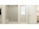 Modern bathroom with a glass-enclosed shower and a built-in bench at 1011 Red Roses Ave, Durham, NC 27703