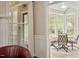 Bright breakfast nook featuring a round table and views of the well maintained backyard at 105 Fifemoor Ct, Cary, NC 27518