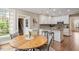Bright open kitchen and breakfast nook, perfect for casual dining at 105 Fifemoor Ct, Cary, NC 27518
