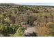 Aerial view of houses nestled in a forest with trees at 109 Boulder Ln, Chapel Hill, NC 27514