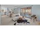 Bright and airy living space with modern decor, sliding glass doors, and a cozy seating arrangement at 109 Boulder Ln, Chapel Hill, NC 27514