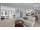 Open-concept living area with stylish decor, comfortable seating, and seamless flow to the dining area at 109 Boulder Ln, Chapel Hill, NC 27514