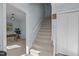 Carpeted staircase leading to the upper level of the home at 109 Boulder Ln, Chapel Hill, NC 27514