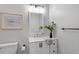 Modern bathroom with vanity, brushed nickel hardware, and a beautiful decorative mirror at 1107 Edgebrook Dr, Garner, NC 27529