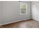Simple bedroom with a large window and closet space, offering versatility for any style at 1107 Edgebrook Dr, Garner, NC 27529