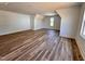 A spacious and bright bonus room features wood-look flooring and ample natural light at 120 Sequoia Dr, Louisburg, NC 27549