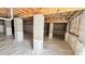 Spacious crawl space features white plastic sheeting and concrete block supports at 120 Sequoia Dr, Louisburg, NC 27549