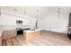 Modern kitchen featuring a large island and stainless steel appliances at 120 Sequoia Dr, Louisburg, NC 27549