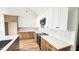Modern kitchen with quartz counters, stainless appliances, and tile backsplash at 120 Sequoia Dr, Louisburg, NC 27549