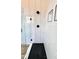 Modern shower with double shower heads features white subway tile and contrasting black honeycomb tile at 120 Sequoia Dr, Louisburg, NC 27549