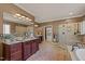 Beautiful primary bathroom with double vanity, granite counters, and a luxurious glass shower at 120 Teasel Ct, Clayton, NC 27527