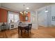 Traditional dining room area with wainscoting and a chandelier at 120 Teasel Ct, Clayton, NC 27527