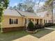 Charming home with black shutters, landscaped yard, and welcoming front porch at 120 Teasel Ct, Clayton, NC 27527